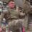 Wrestling Royal Marines baffle passers-by as they kick each other in privates
